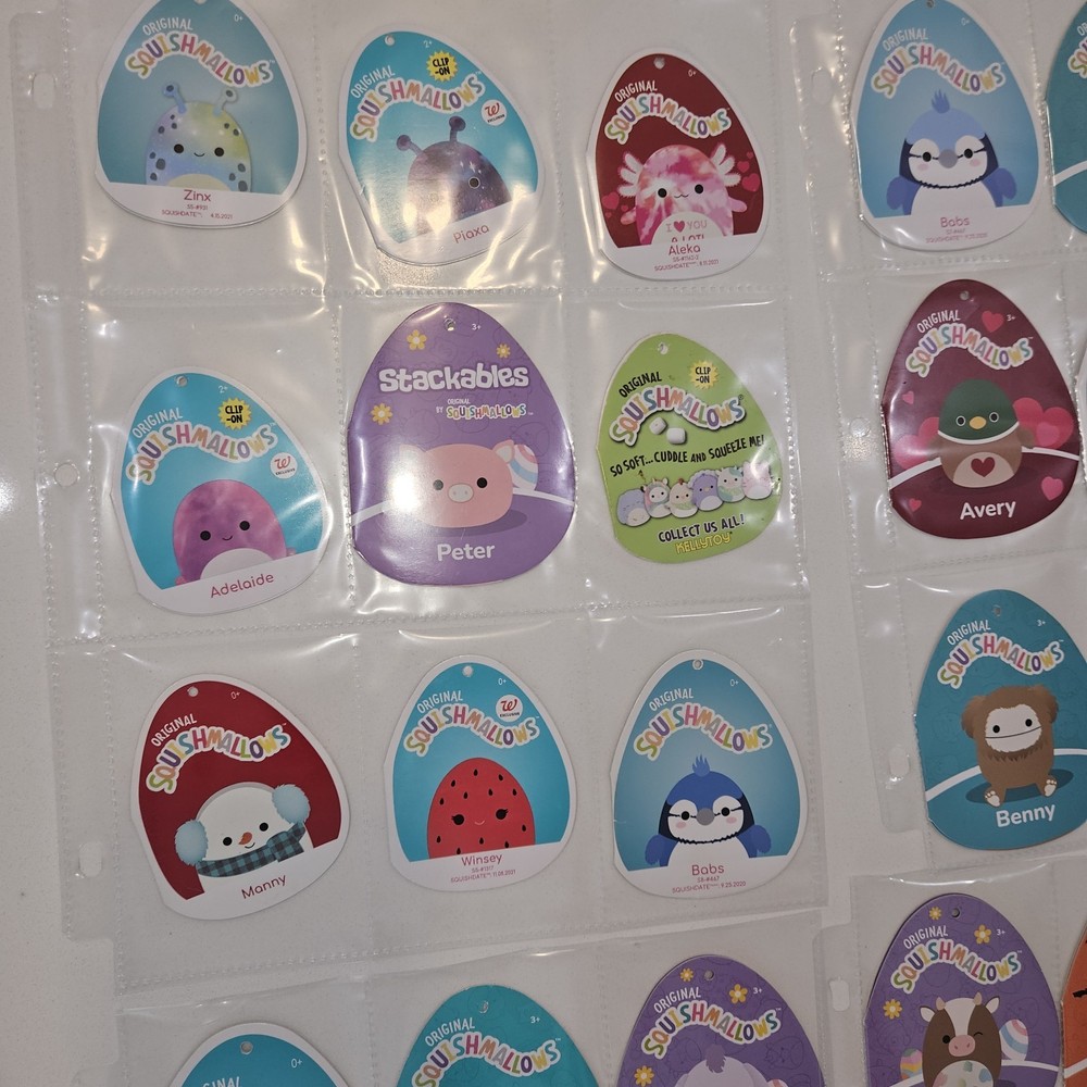 71 Squishmellow Tags In Binder. TAGS ONLY