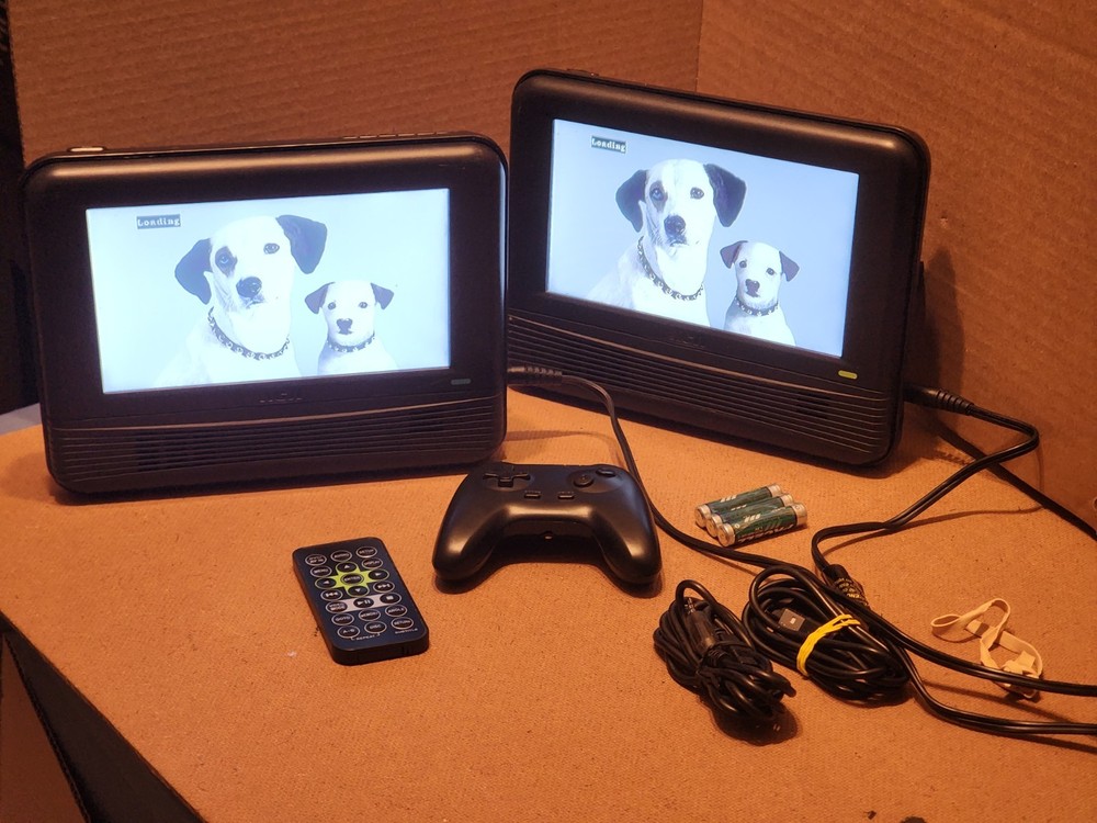 RCA 7" DOUBLE PLAY MOBILE DVD SYSTEM DUAL SCREENS GAME W/CONTROLLER DRC62705E24G