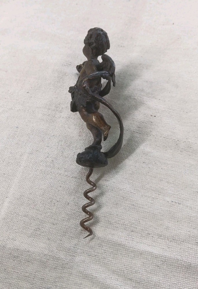 COLLECTABLE BRONZED CORKSCREW WITH WINGED CHERRUB HANDLE