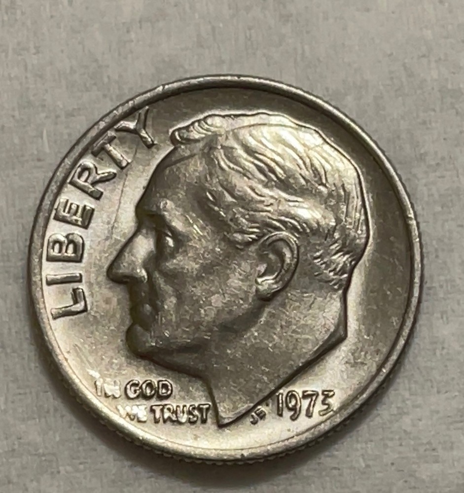 1973 no mint mark dime with DDO error