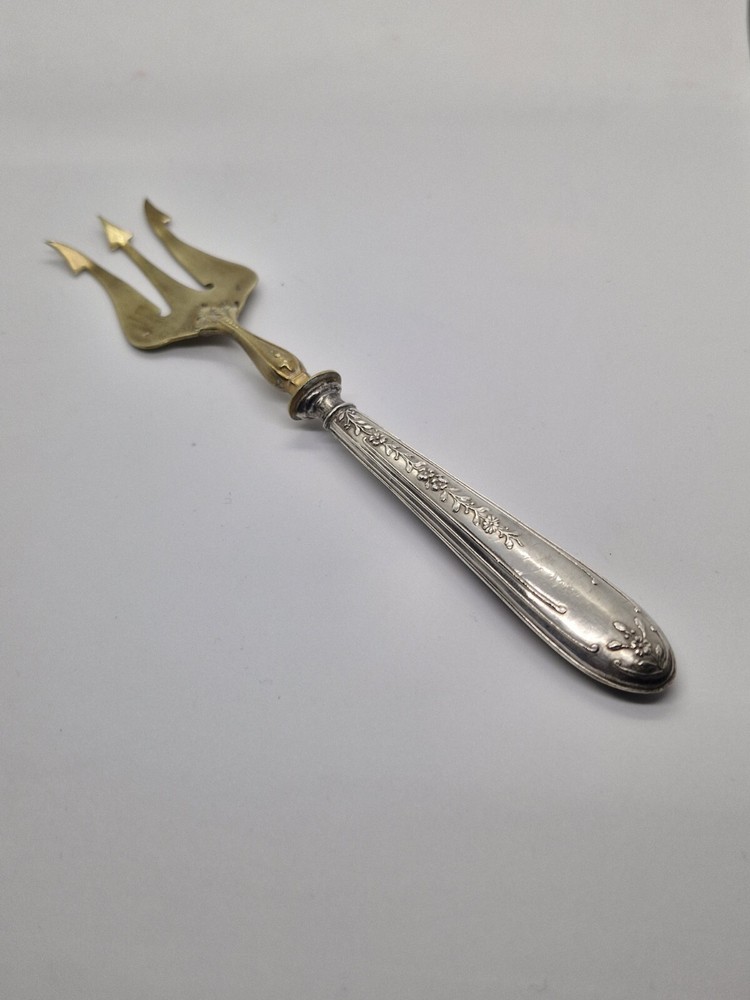 Vintage Antique brass fork with silver handle