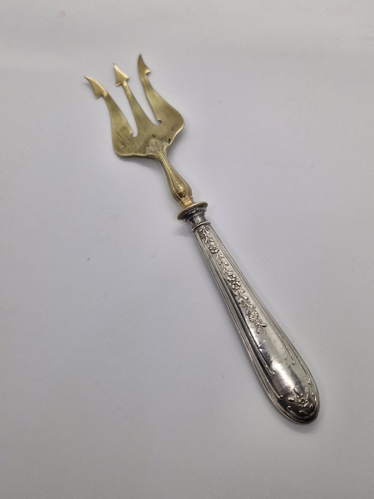 Vintage Antique brass fork with silver handle