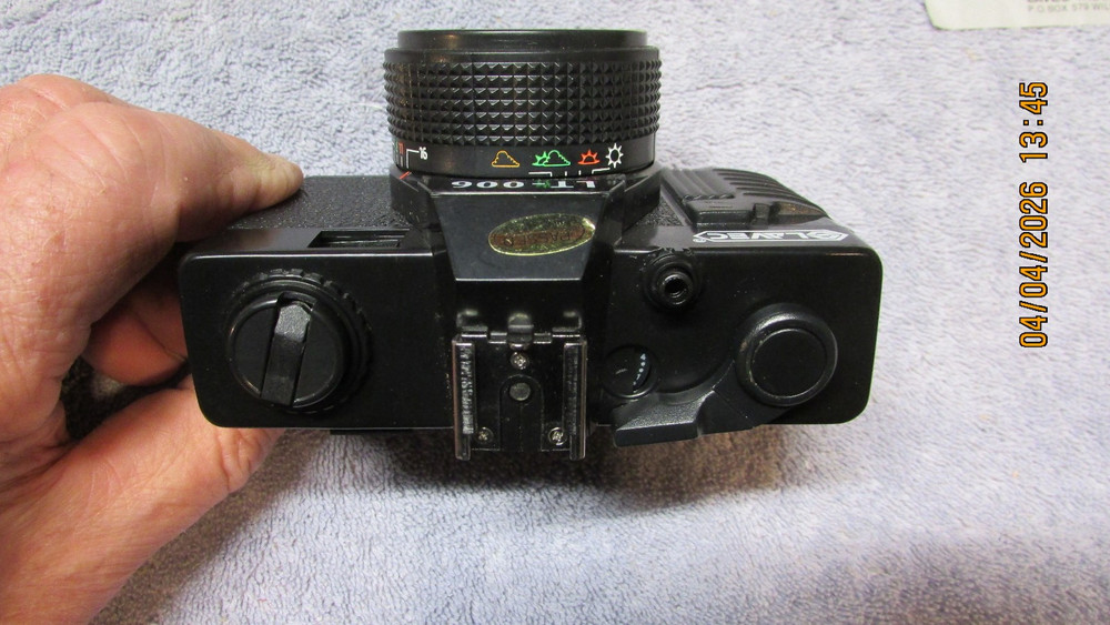 3 vintage cameras.