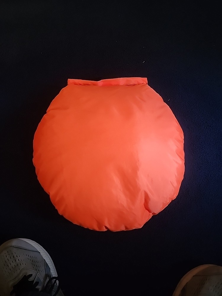 Orange Hunting Seat With Beads In It
