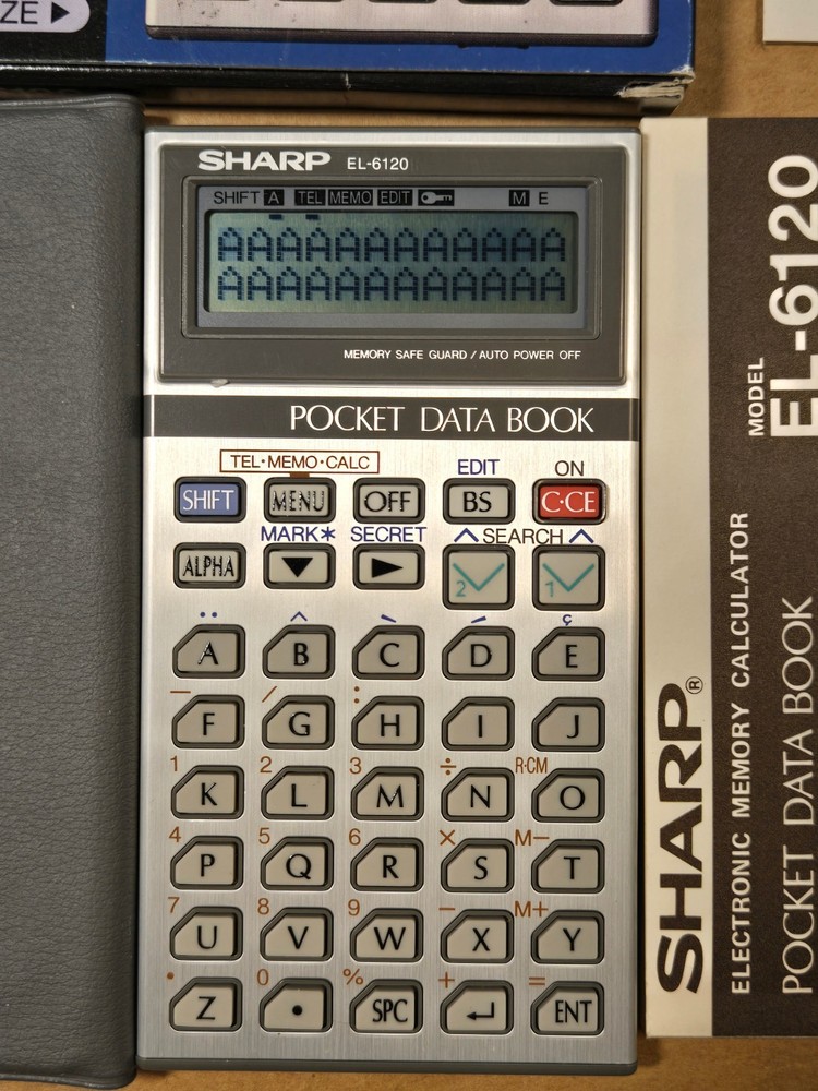 Sharp EL-6120 Pocket Data Book Electronic Calculator - Mint In box