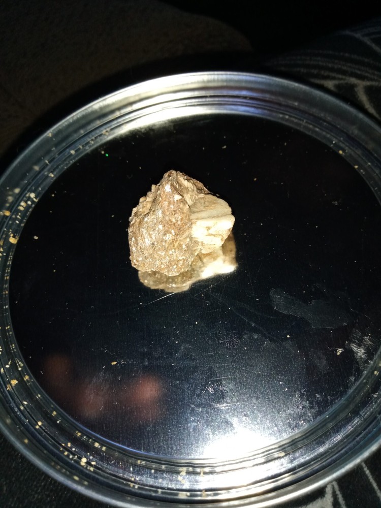 qurter size rock with platinum or gold