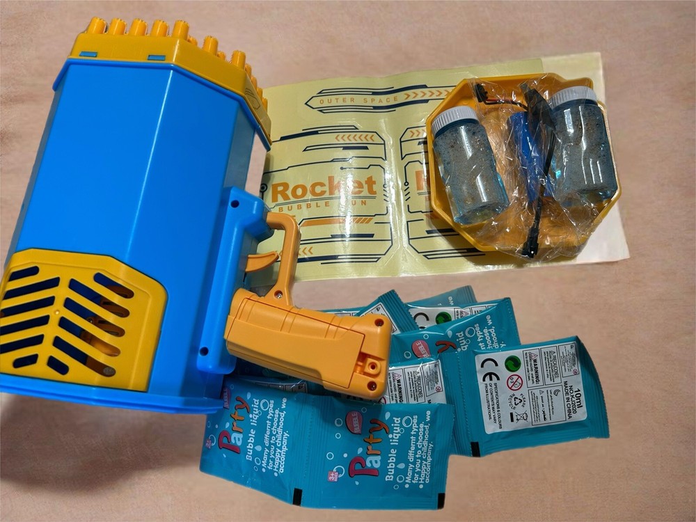 Rocket Bubble Gun With Extra Packs Of Solution