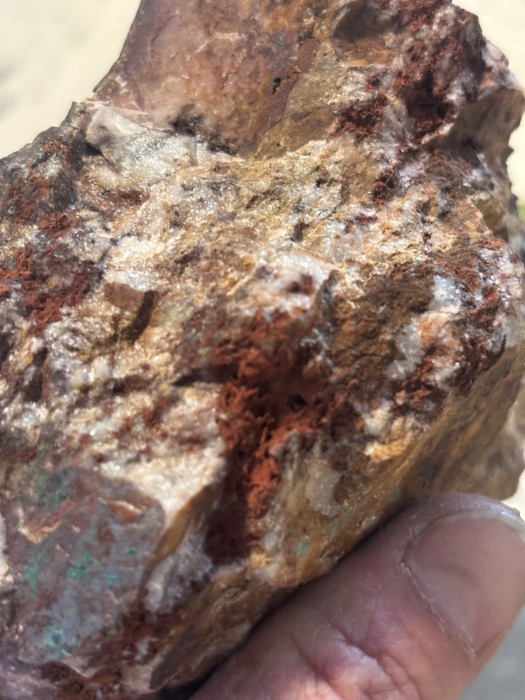 highly mineralized gold ore on quartz