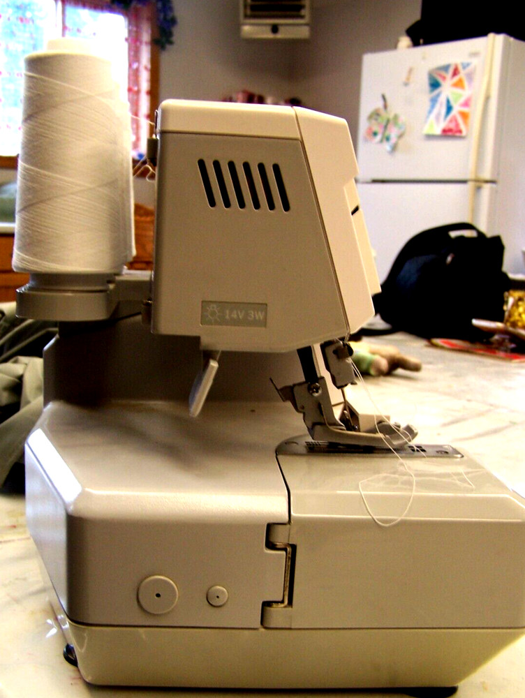 used Elna Lock Pro 4 DC Overlock Serger Machine plus Accessories powers up