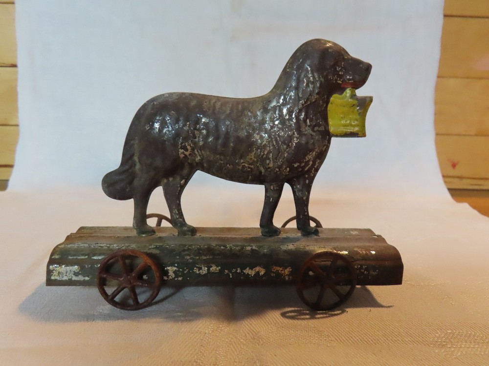 Antique tin dog pull toy