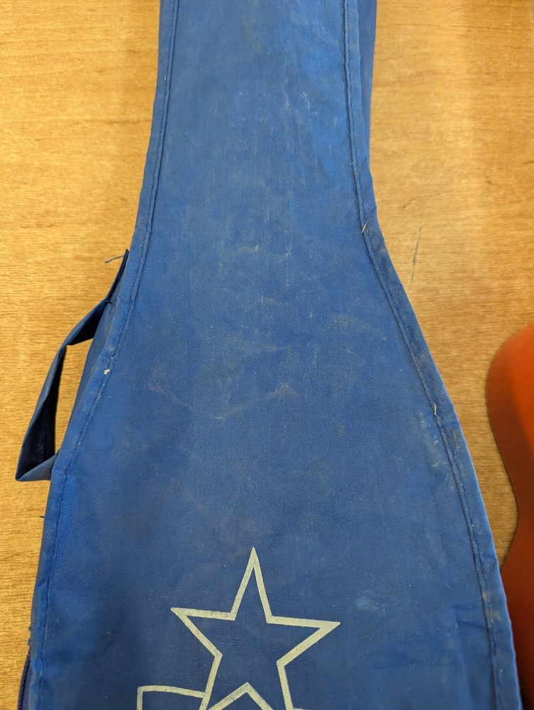 Octopus Soprano Ukulele Red with 4 Strings Includes Case for Beginners