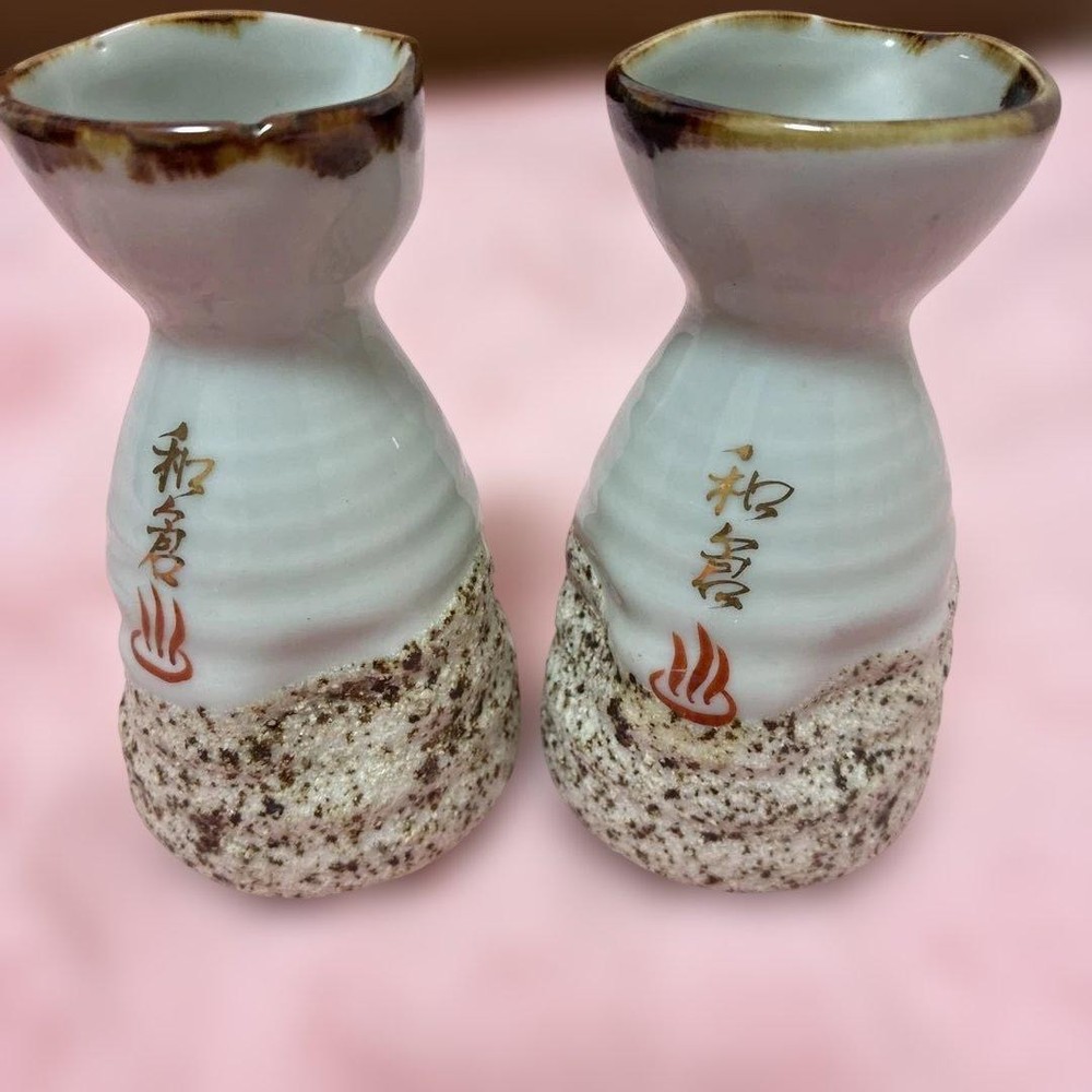 2 sake bottles with Wakura Onsen logo