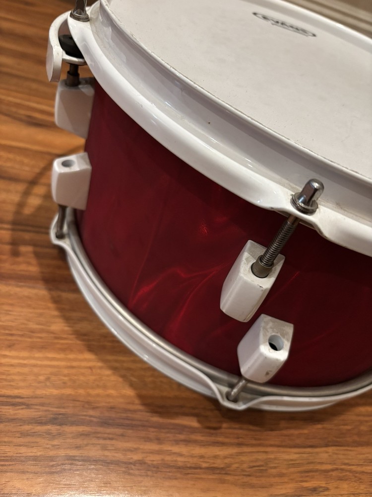 Evans 12" Round Red Drum Drumhead with World Max Drum Support System