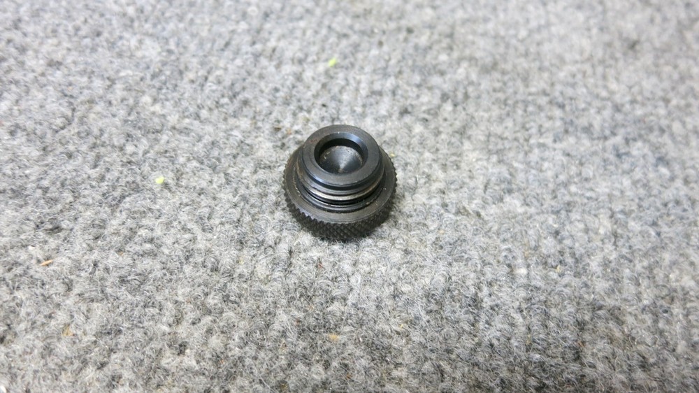 THOMPSON CENTER, .50 CAL, BLACK DIAMOND MUZZLELOADER STRIKER END CAP, VG USED.