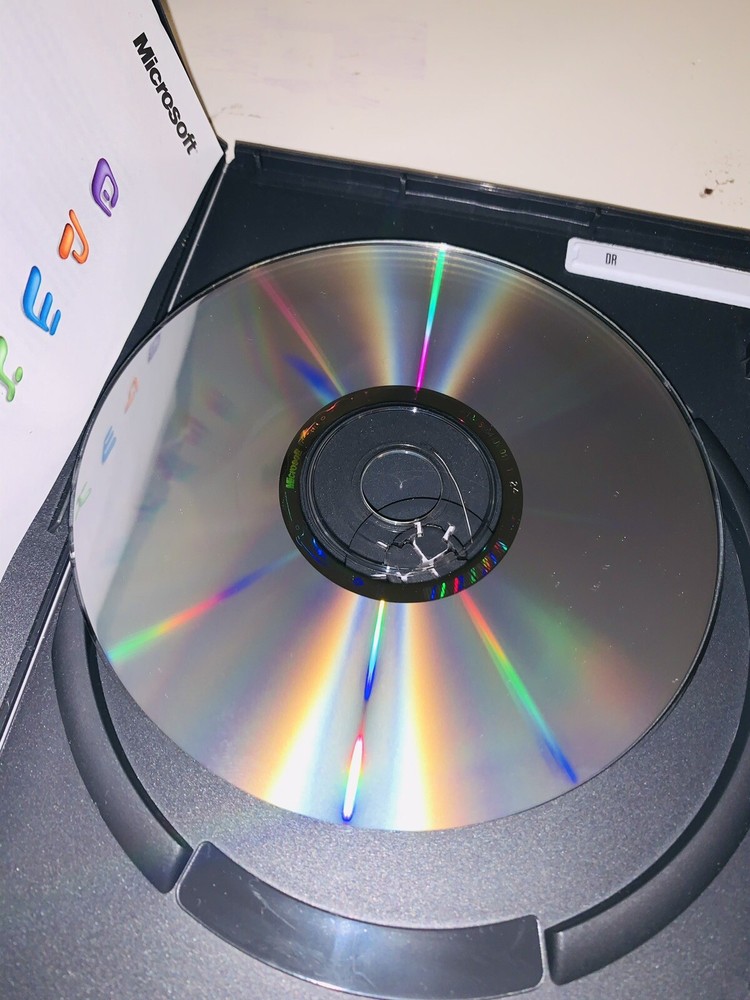 Microsoft Office:mac 2004 Student and Teacher Edition includes 3 installs Apple