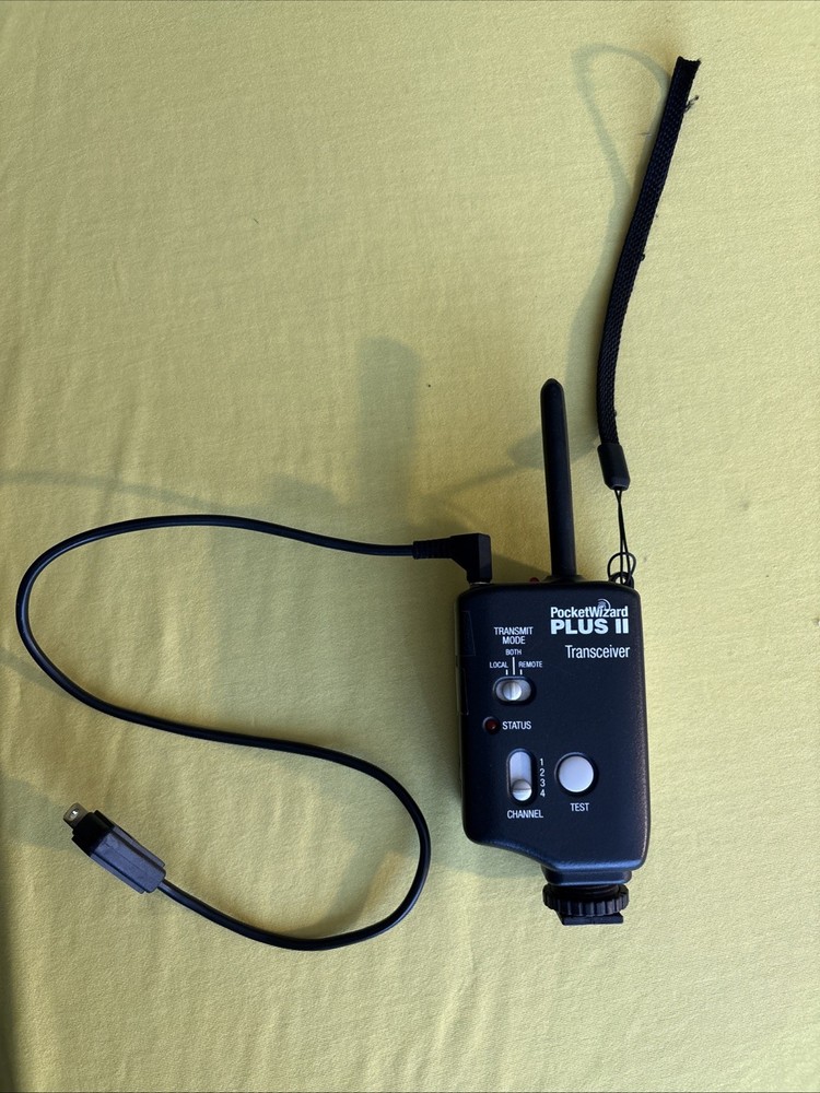 PocketWizard Plus II Transceiver Plus Stroboframe And Neewer Remote.