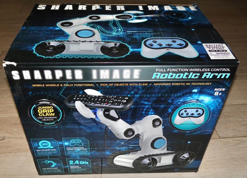Sharper Image Remote Control Robotic Arm with Spotlight Claw Tank Tread Wheels