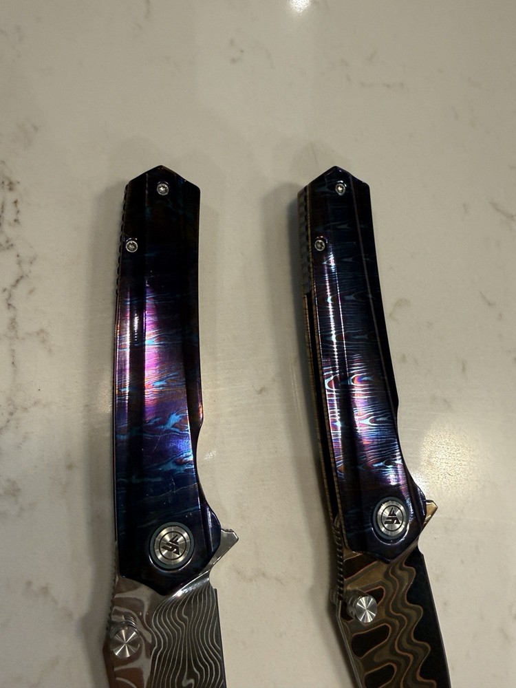 2 YF knives solid price break. Few scratches . No box.