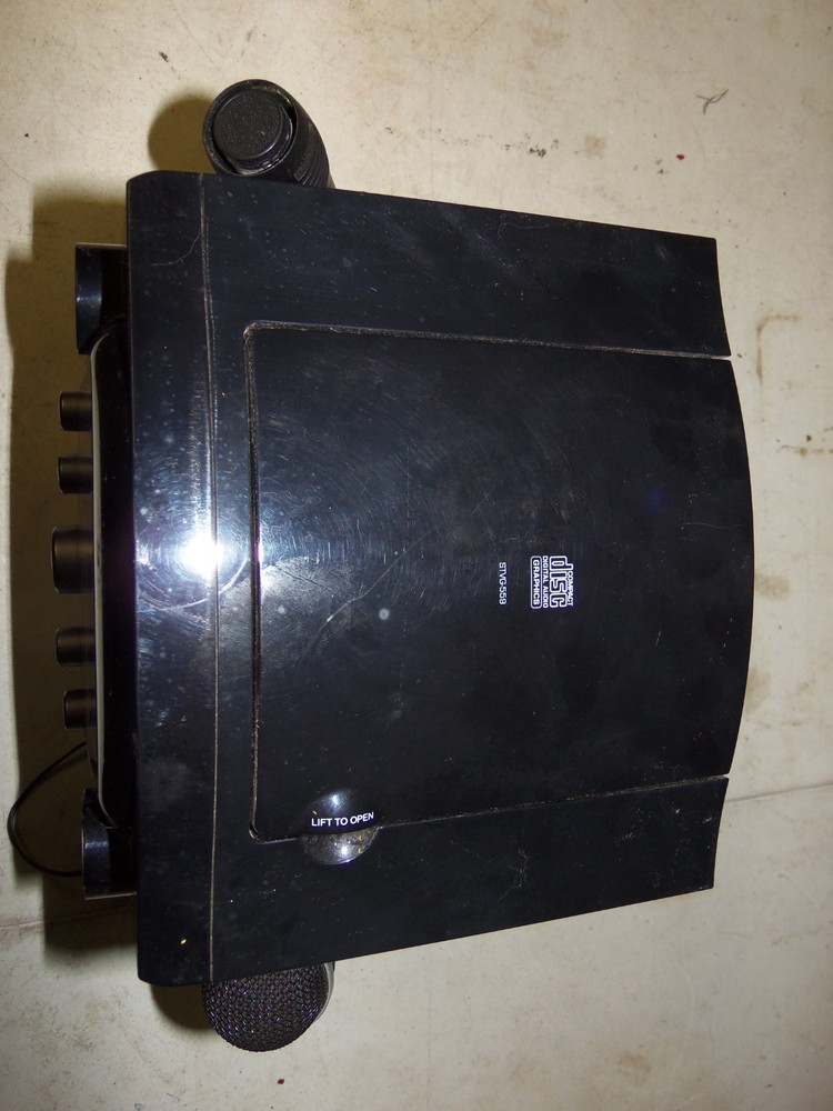 The Singing Machine, Model STVG - 559, Powers on but does not work correctly