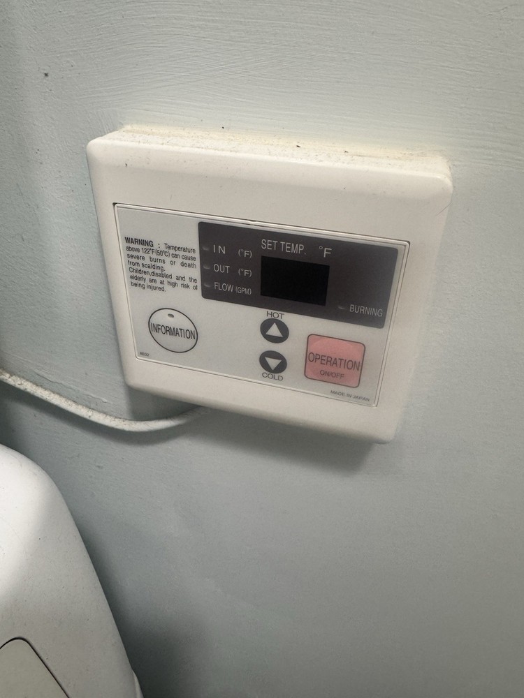 Takagi TK-110U-I 140,000 BTU Tankless Natural Gas Water Heater - White