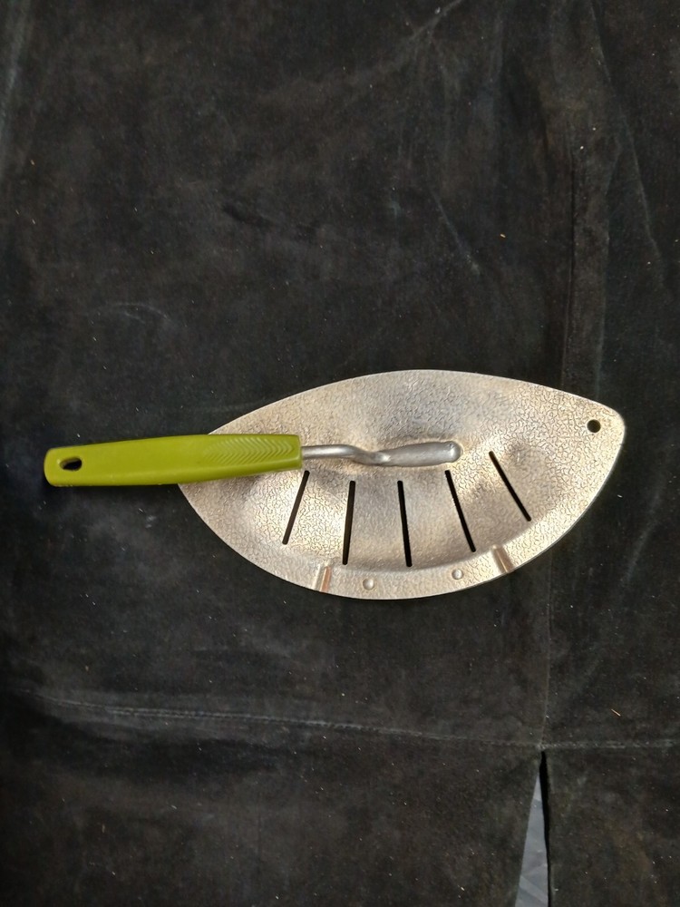 Vintage pot strainer