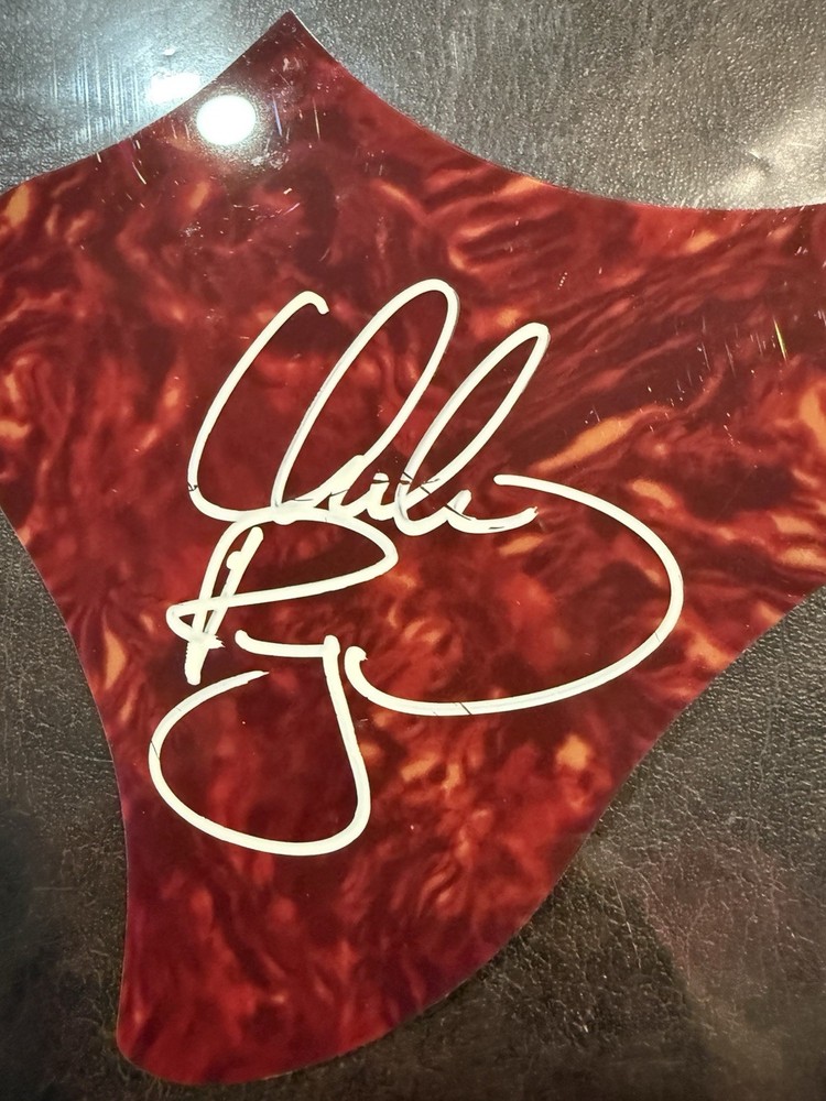 Usher Signed Pick Guard (TSA COA)
