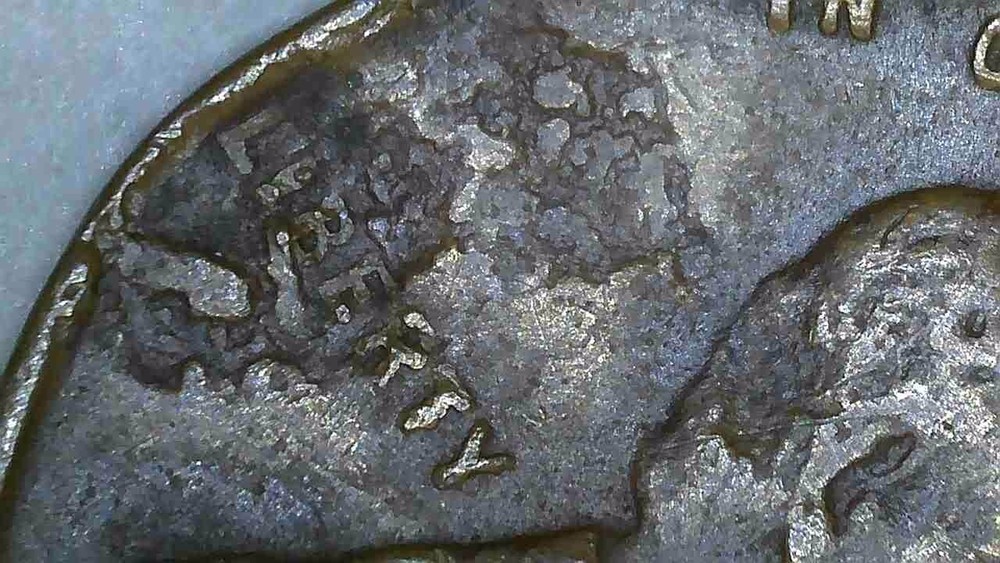 1945 P lincoln penny with lamination error.