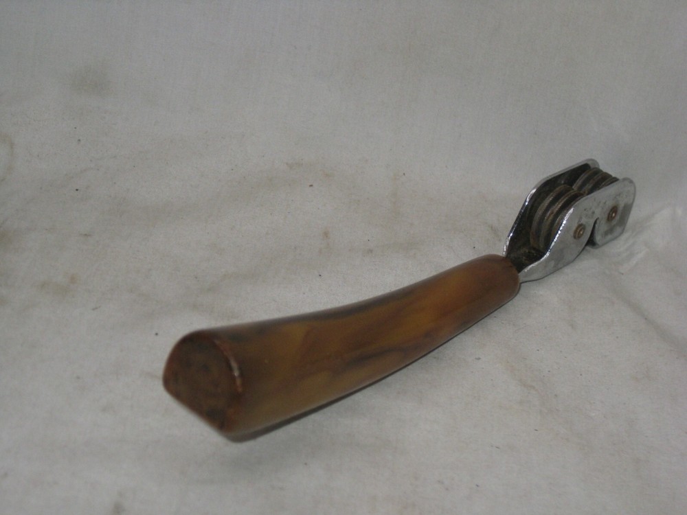 vintage marblized Bakelite handle knife sharpener sharpening utensil