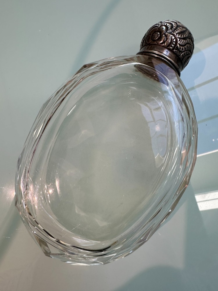 Pocket flask with sterling lid