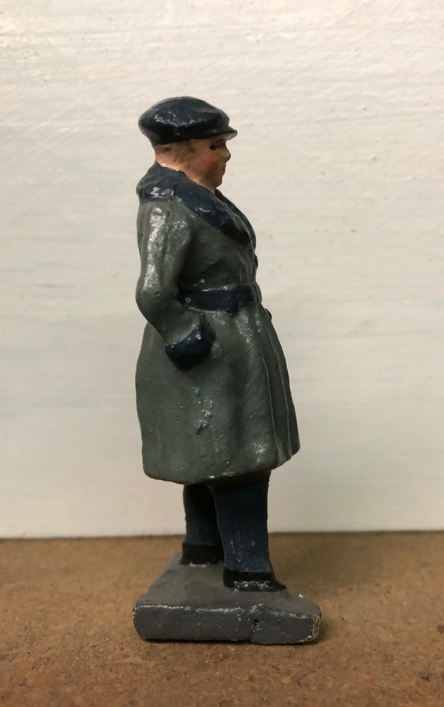 RARE TRAIN PASSENGER STANDING, PAINTED COMPOSITION 3.25 INCHES TALL