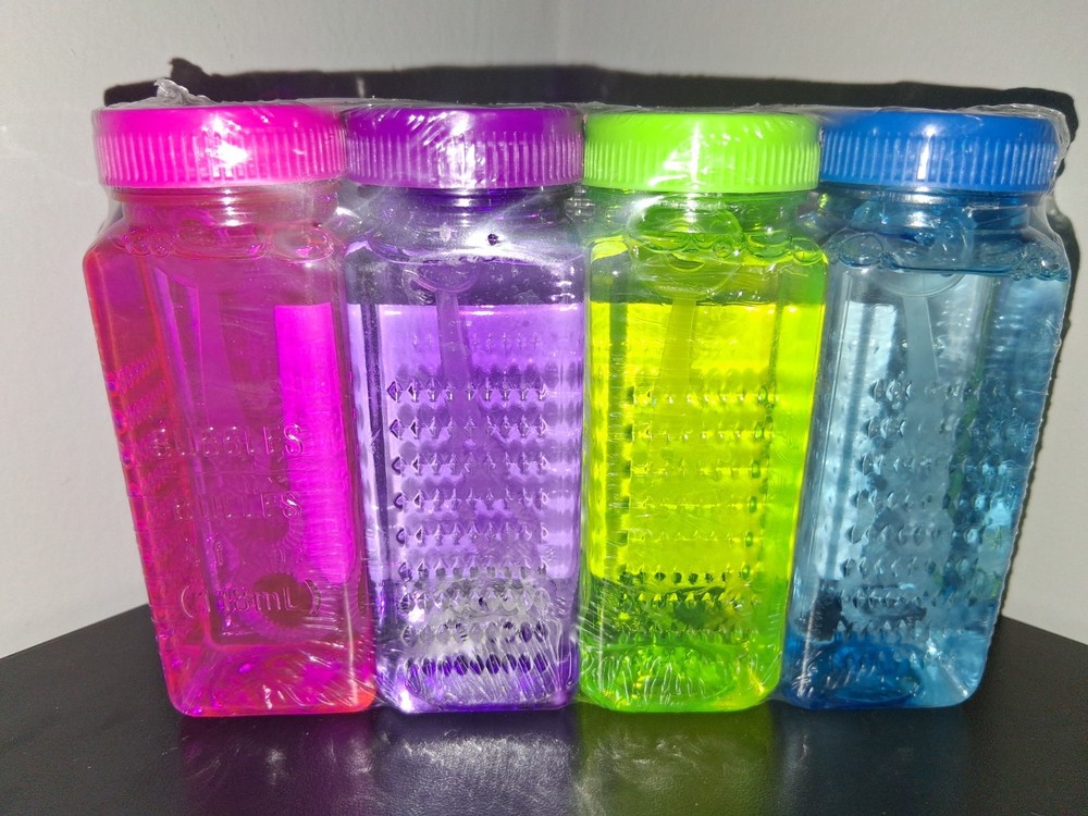 Blowing Bubbles 4 Pack Summer Spring Fun Different Colors With Wand 4 fl oz each