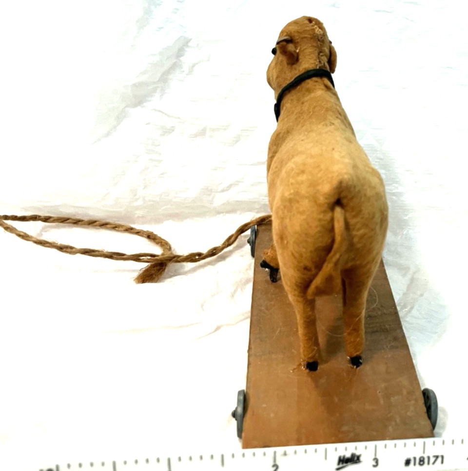 Antique childs felt covered pull toy