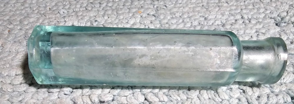 Small Octagon shaped Light Green Antique Bottle EMPTY