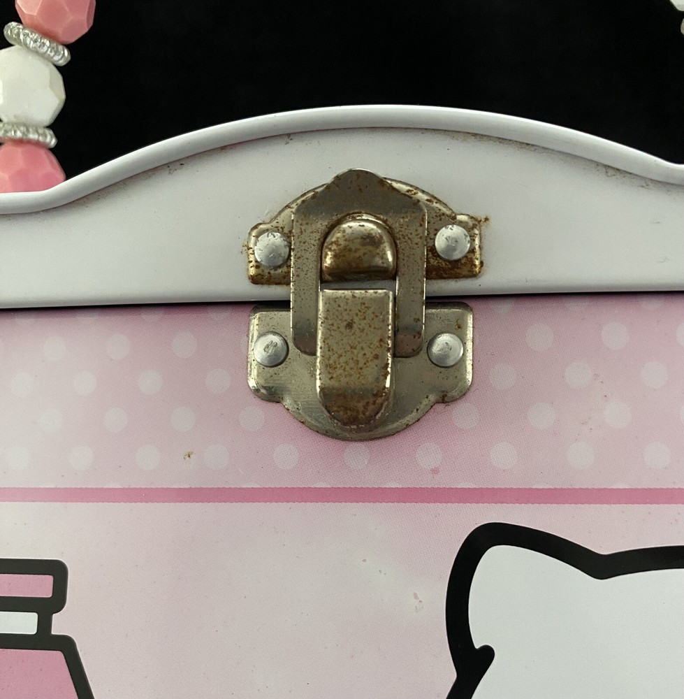 1976, 2012 Sanrio Hello Kitty Tin Box Co. Lunchbox w/ Beaded Handle.