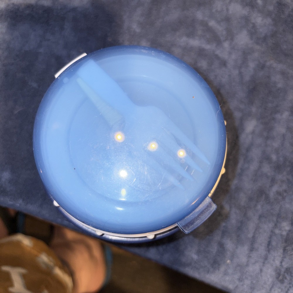 Insulated Food Storage Container With Folding Spoon And Fork