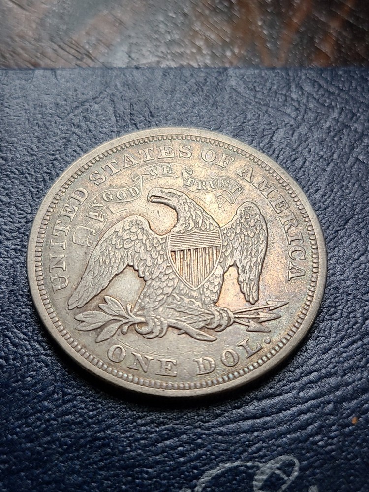 1870 Seated Liberty Dollar Fine