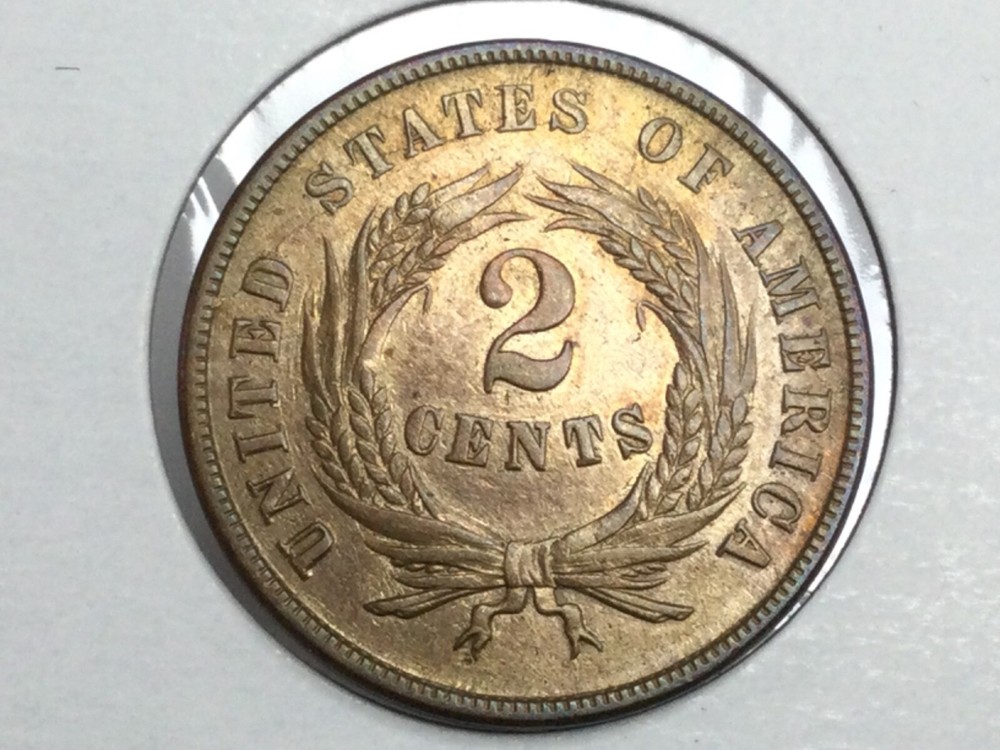 1866 Two Cent Piece in almost uncirculated