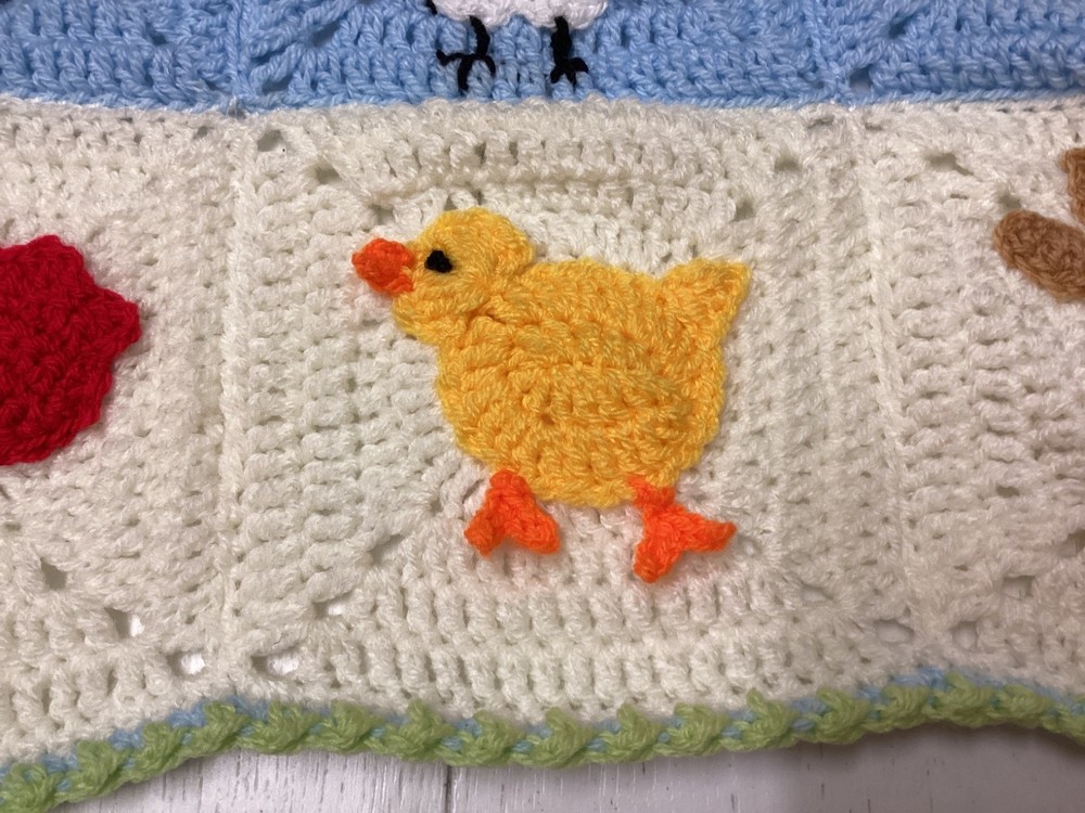 One Handmade Crochet SPRING/EASTER themed blanket 65cmx52cm