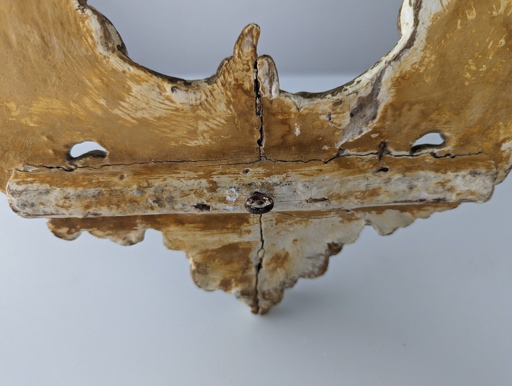 Antique gilt stuccoed wood frame
