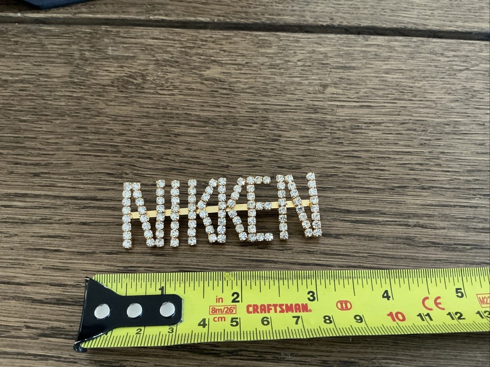 NIKKEN Company Rhinestone Advertising Pin