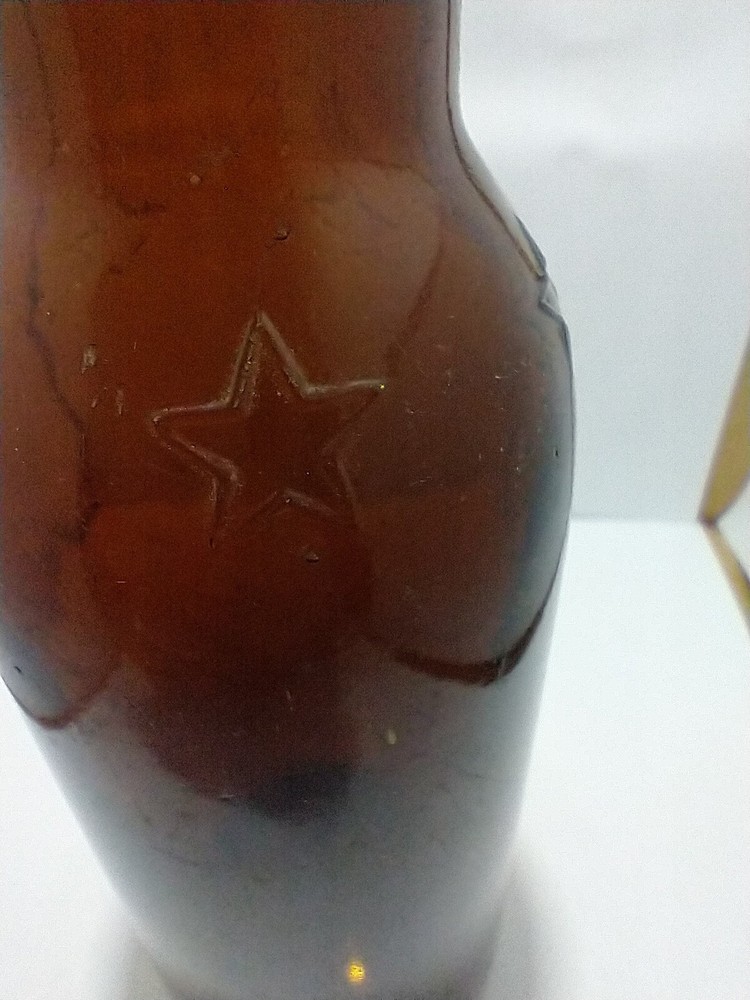 Amber Embossed Star Beer Bottle Saginaw Mi.