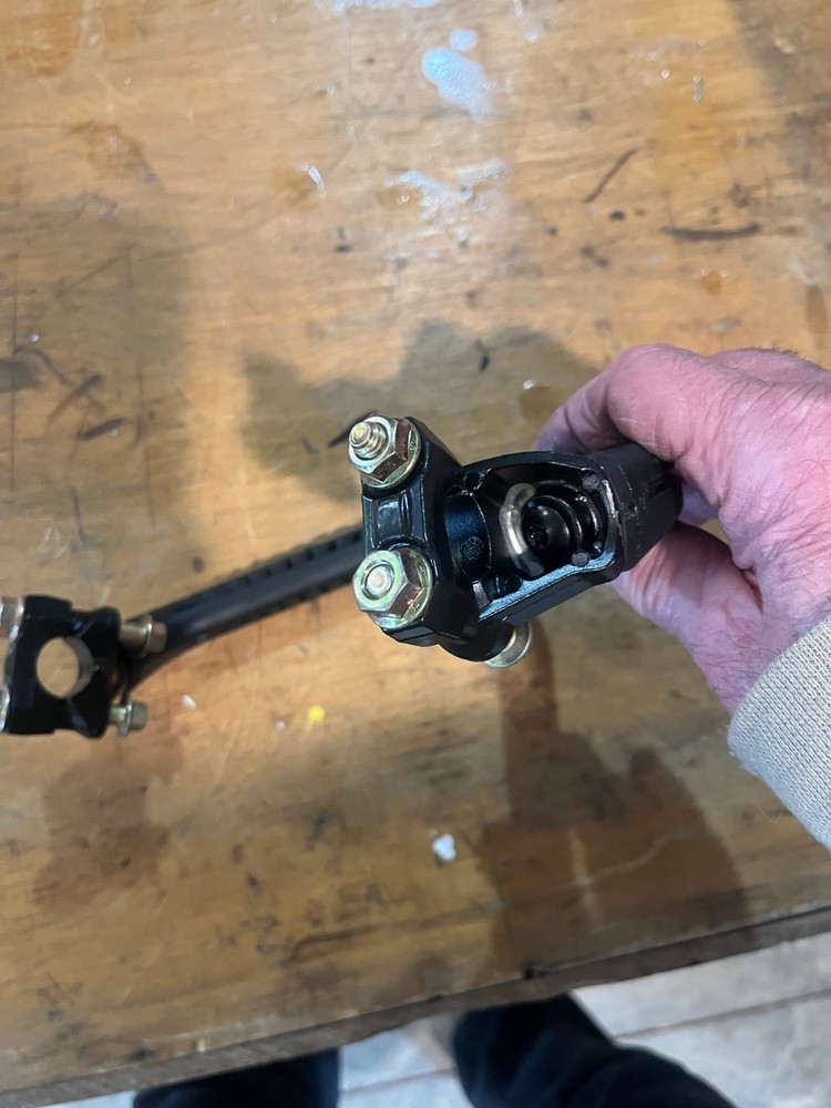 Mountain snowmobile side hill handle bar strap