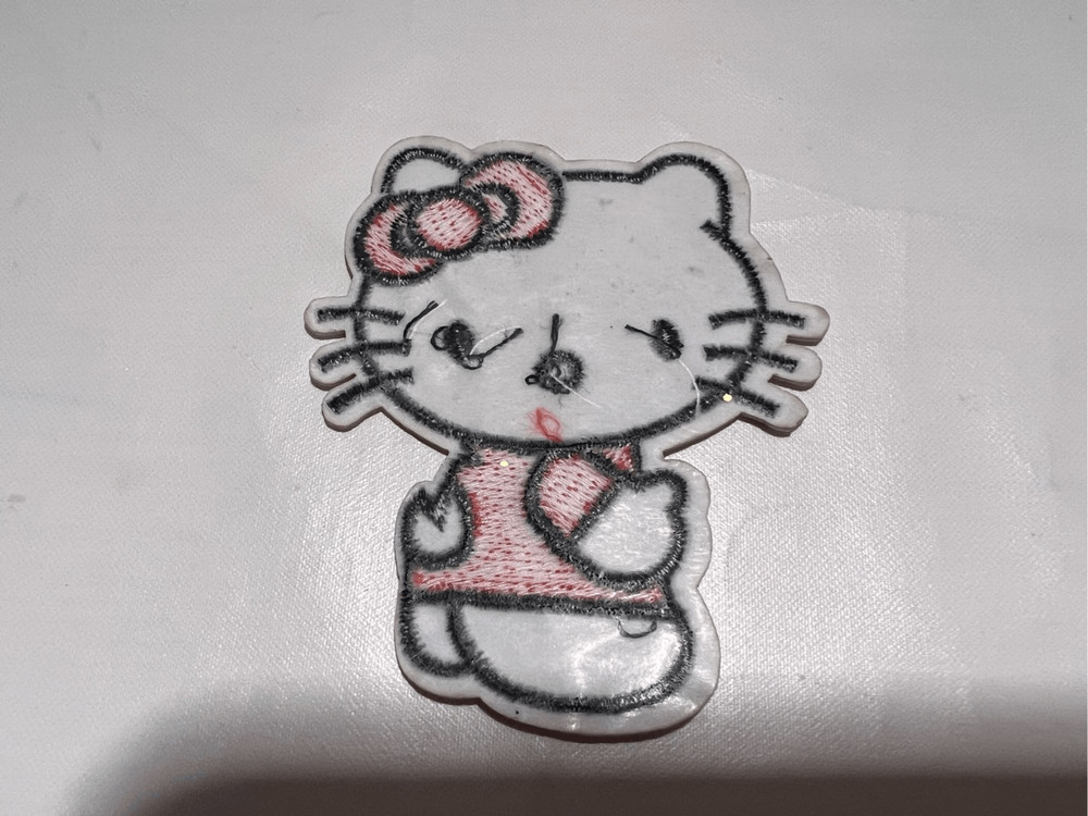 Hello Kitty Looking Over Shoulder Iron on Patch