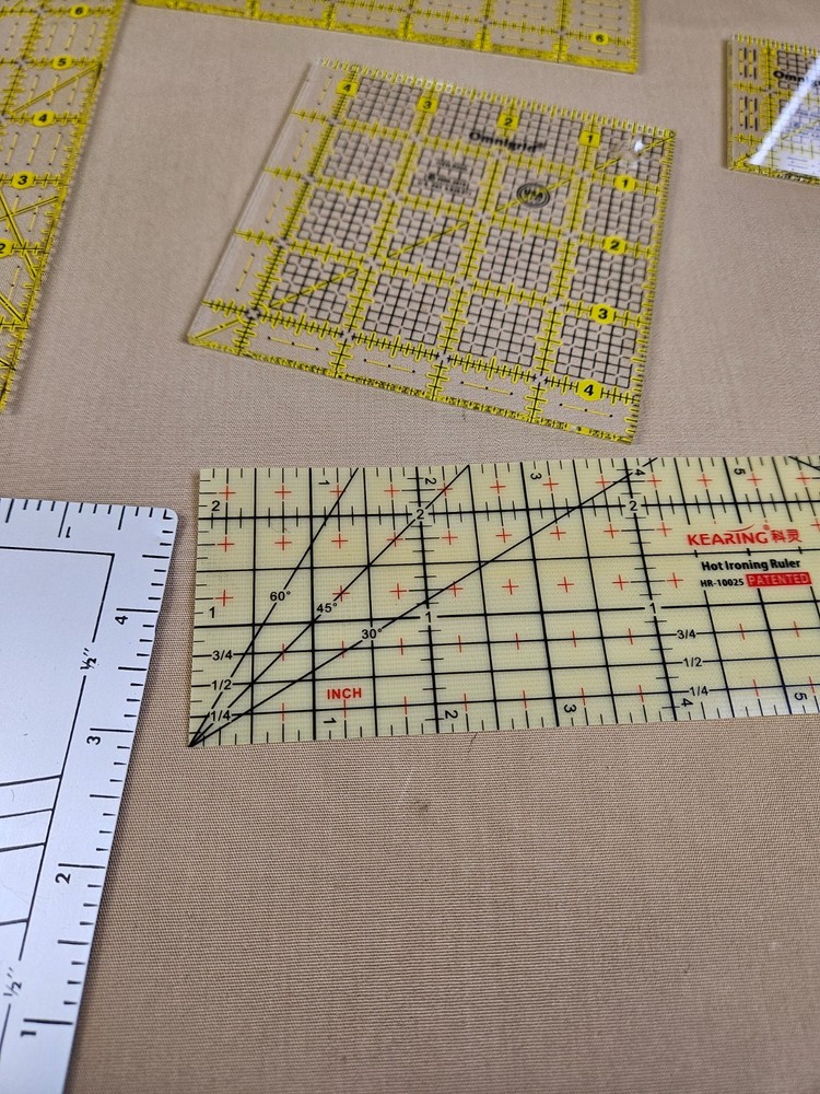 Assortment of Omnigrid measuring tools w/ Dritz Ezy-hem