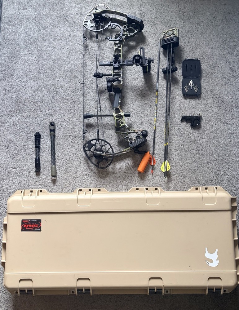 Matthew’s Triax Bow with Accessories and Case