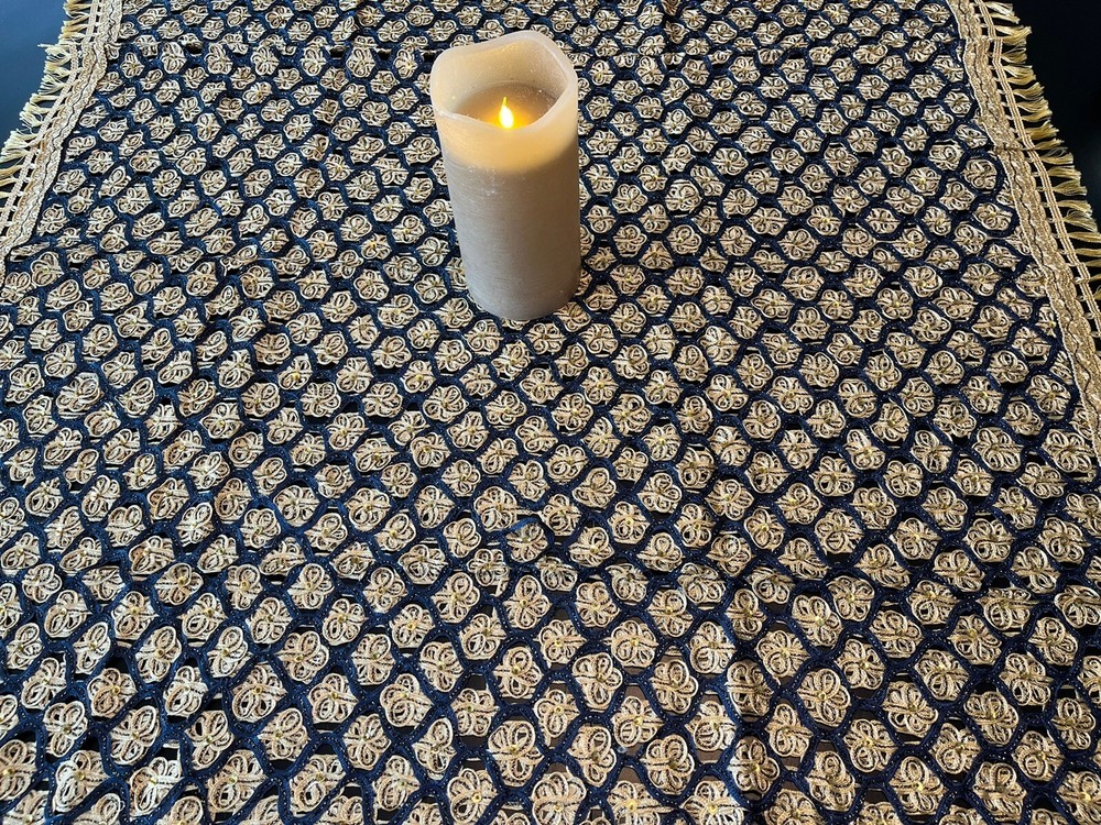 Very elegant handmade table center piece .