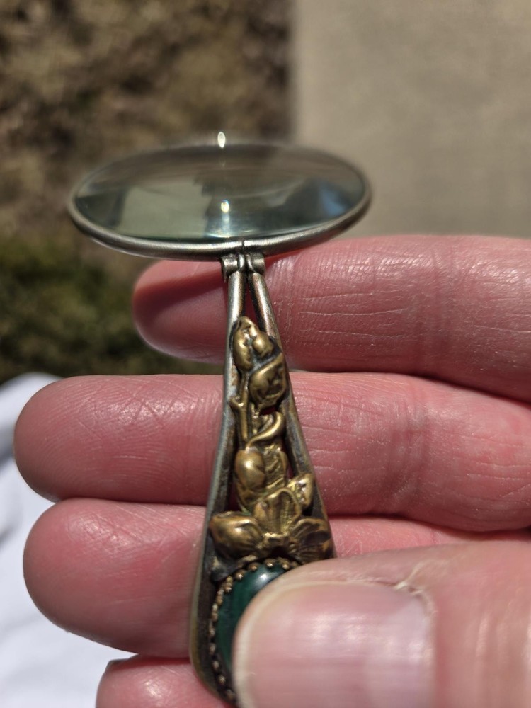 Vtg. foldable magnifier w/possible malachite stone in handle.