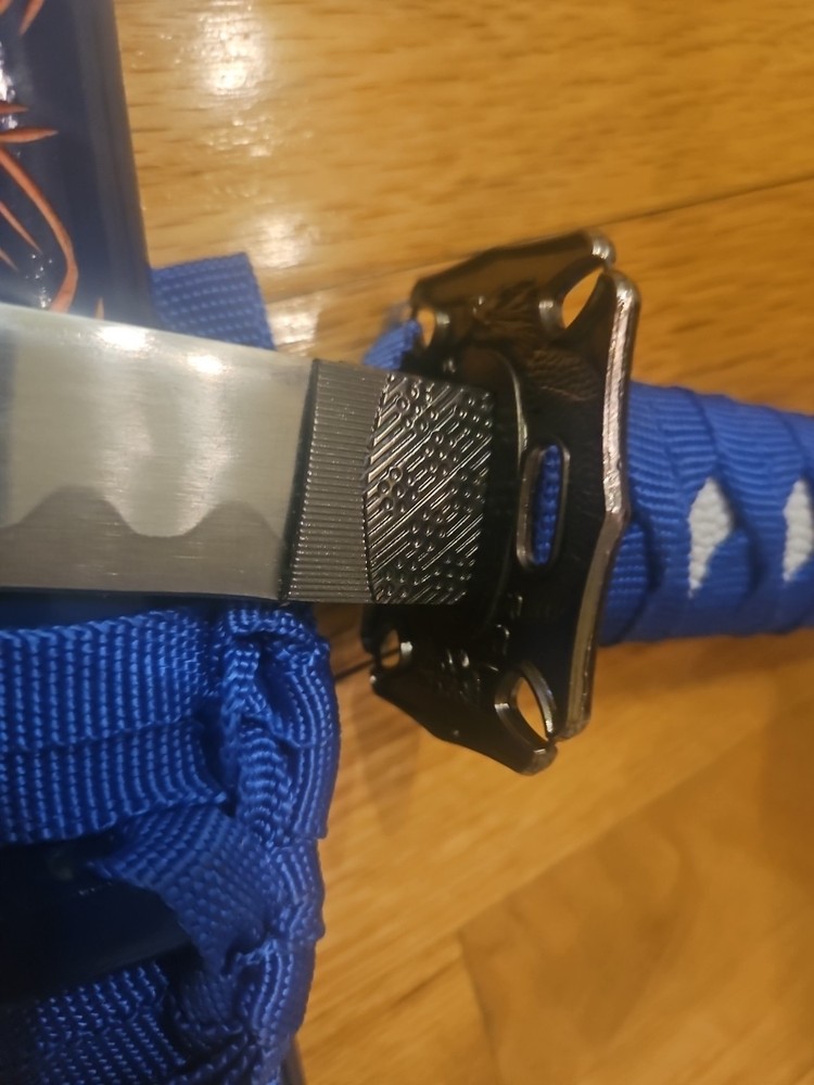 Blue Wrap Carved Dragon Sword 21 Inches
