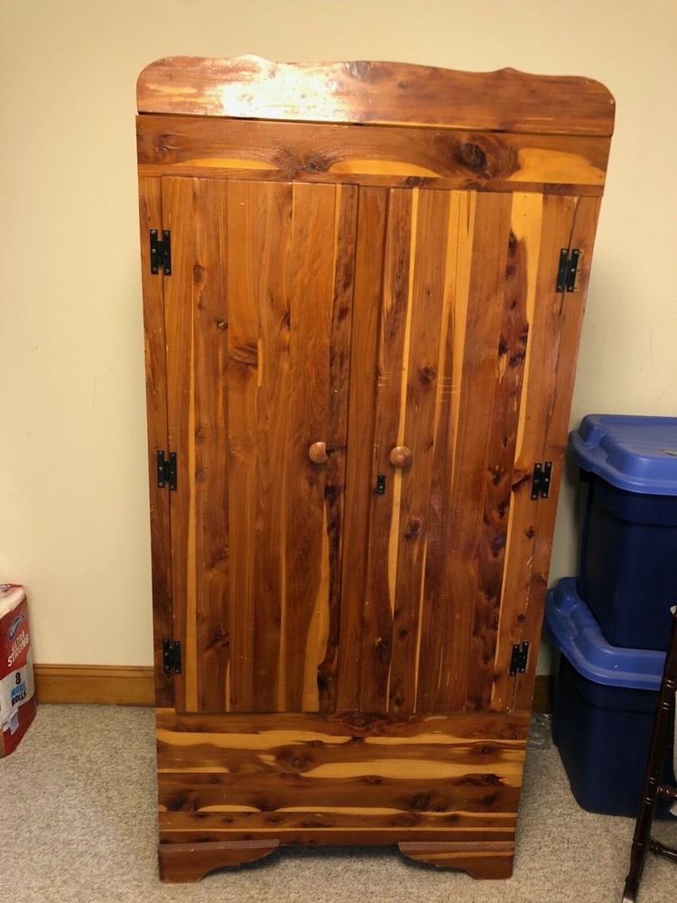 cedar wardrobe with hanging bar, 2 latching doors, good condition
