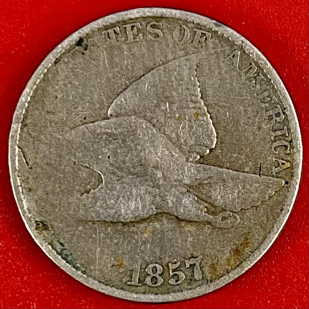 1857 FLYING EAGLE CENT, FILLED DIES ERROR